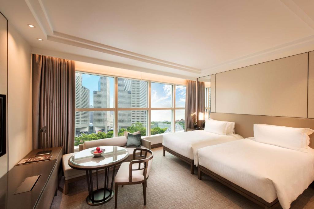 dal travel Conrad Centennial Singapore